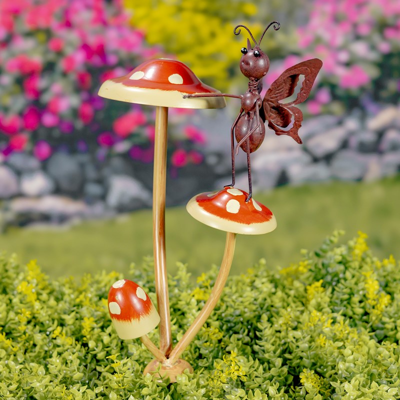 ASSORTED BUSTLING BUTTERFLIES ON IRON MUSHROOM GARDEN STAKES