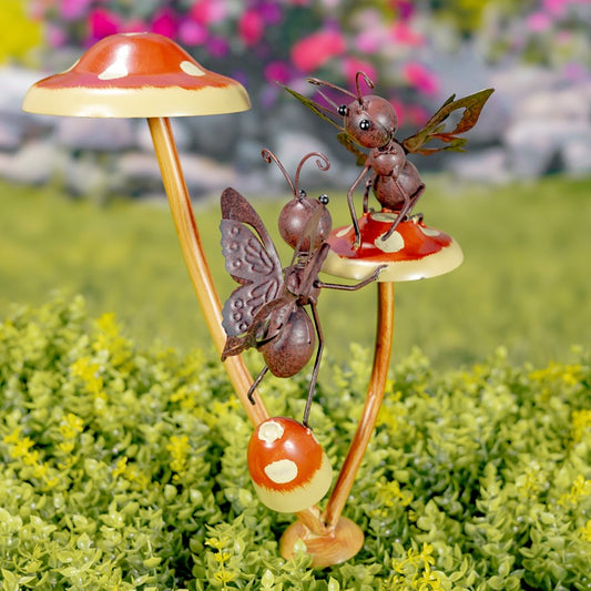 ASSORTED BUSTLING BUTTERFLIES ON IRON MUSHROOM GARDEN STAKES